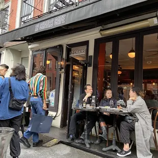Front of restaurant. Heated seating area across from it.