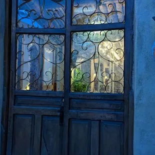 the reflection of a building in the window