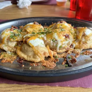 Smothered pierogies
