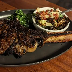 a steak and a side salad