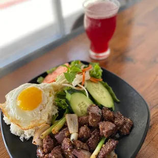 a plate of food and a drink