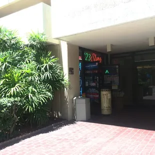 If you're walking toward Ala Wai Blvd, it will be on the left side of the street, but you have to find it hiding here