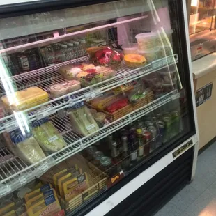 Sandwiches, sushi, fruit, Mac salad...a little bit of everything