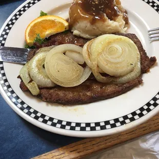 Liver &amp; onions with bacon.  Soup or salad included.