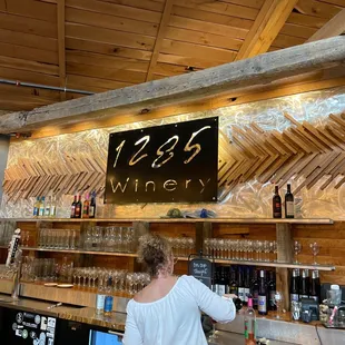 a woman at the bar