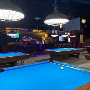 a pool table in a bar