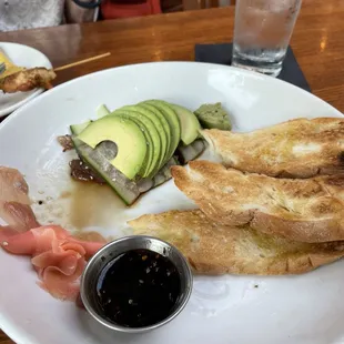 This is what they called a Tuna Avocado Roll with Teriyaki Sauce.  It was awful.  The restaurant should be embarrassed.