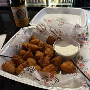 They have a food menu that you can order from a couple nearby restaurants. Mac and cheese bites.