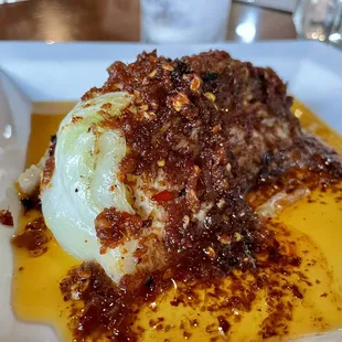 Butter Braised Cabbage - $9- quarter cabbage braised in brown butter and house kimchi paste