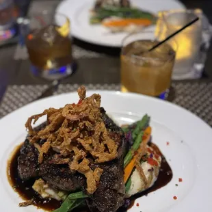 This is the black coffee rubbed ribeye steak over veggies and garlic whipped potatoes