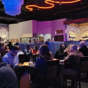 Photo of the restaurant with a view of the open kitchen