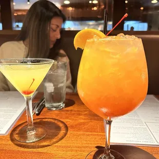 Apple Martini and the beverage that's named "secs"on the beach