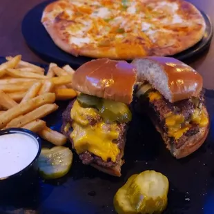 Tavern burger with an extra patty, French fries and the Buffalo chicken pizza