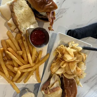 Turkey Melt paired with irresistible Homemade Kettle Chips and the BBQ Bourbon Swiss Burger accompanied by Fries