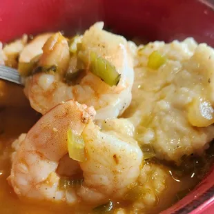 Close up of cheesy grits and shrimp