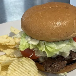 The Basic Burger is not basic, look at this juicy Burger with Mayo, tomato, lettuce and onions. So good!