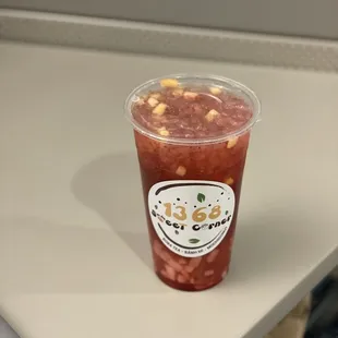 a drink in a plastic cup