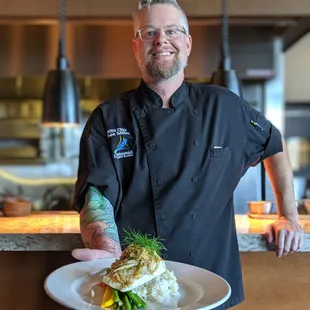 Chef Ben with his featured dish - Pan Seared Halibut