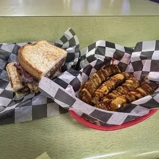 Pastrami sandwich with corn ribs; A1