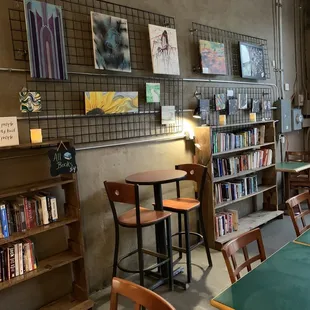 Wall of books and art work