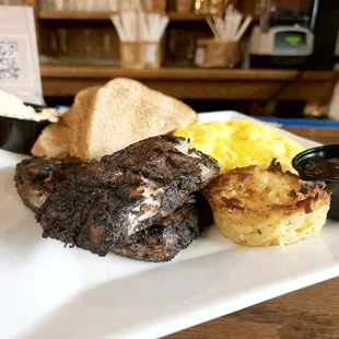 Jerk Catfish. Eggs Scrambled with Cheddar. Hashbrowns. Toast.