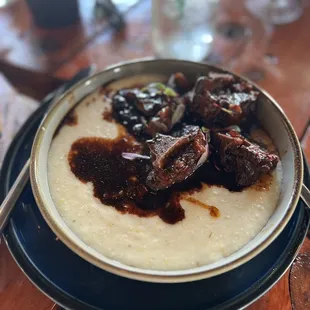 Grits and oxtail