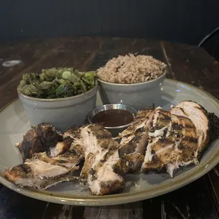 Jerk chicken with Callaloo, rice and peas.