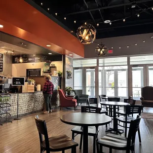 a man standing in a coffee shop