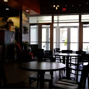 tables and chairs in a coffee shop