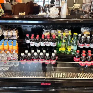 a display case full of drinks
