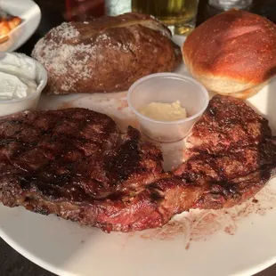Ribeye w/backed potato and roll