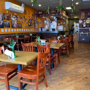 Cash register &amp; counter inside restaurant.