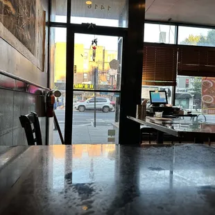 a view of the street through the window