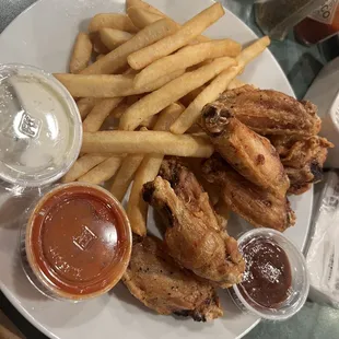 Wings and fries...Naked with out sauce got them on the side!