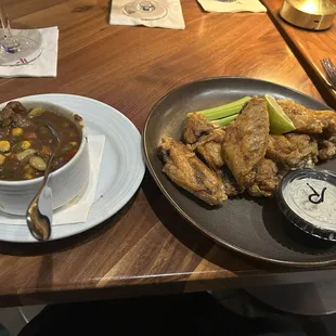 Beef and vegetable soup and dry rub wings both dishes