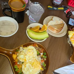 Veggie skillet and meat lovers skillet...country gravy on the side to pour all over;)