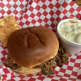 Pulled Pork sandwich, corn bread, white Mac and cheese