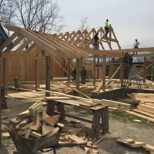 ows the construction of a house
