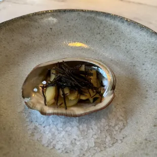 Poached local abalone, goraka, treacle butter, black Australian truffles