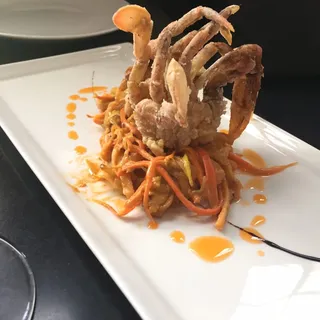 Soft shell crab, corn anglaise, traditional fish cutlet, our bacon**