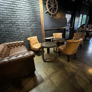 a group of people sitting in a coffee shop
