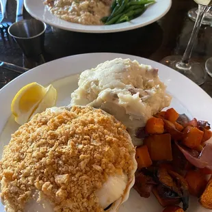 Baked scallops, mashed potatoes and root vegetables