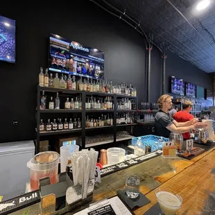 a man and a woman at a bar