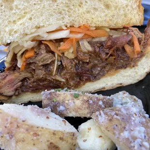 Korean BBQ sandwich and potatoes