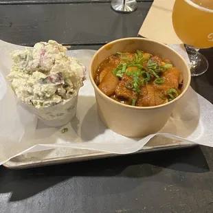 Sides of smoked potato salad and baked beans