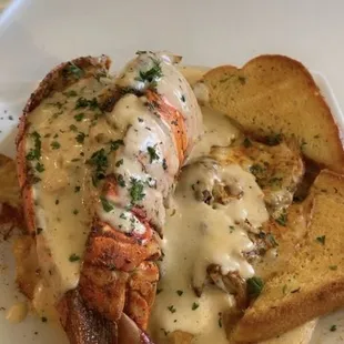 Jerk chicken Alfredo with lobster tail! Sooo goood!