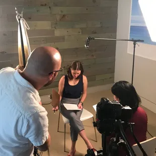 Using the conference room for a video set-up to interview business owners