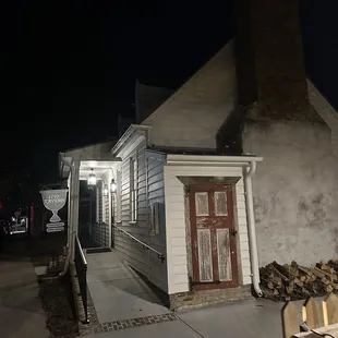 the front of the building at night