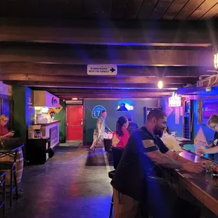 people sitting at the bar