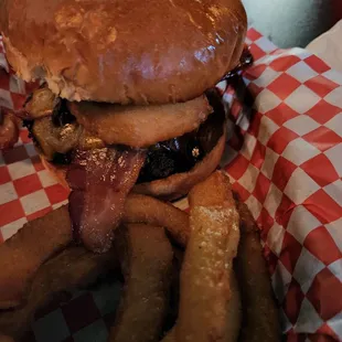 BBQ bacon burger with onion rings.